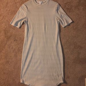 A pale lime green and whit striped dress